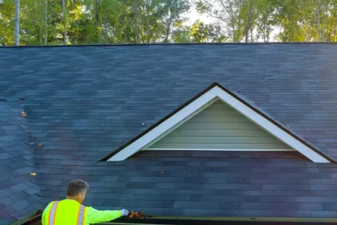 A person working on a roof replacement in the Denver metro area